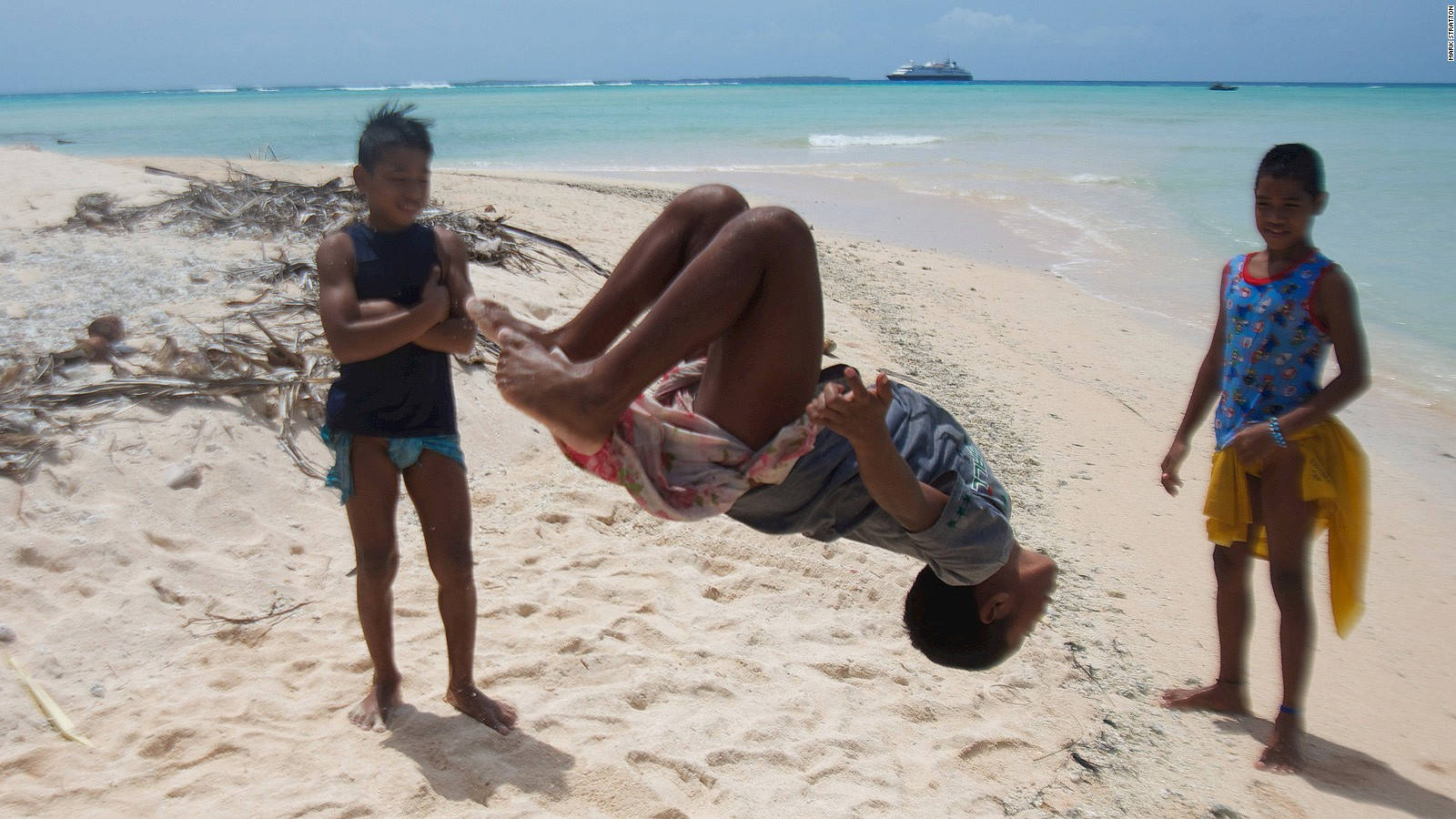 Micronesia Boy Doing Backflip Wallpaper