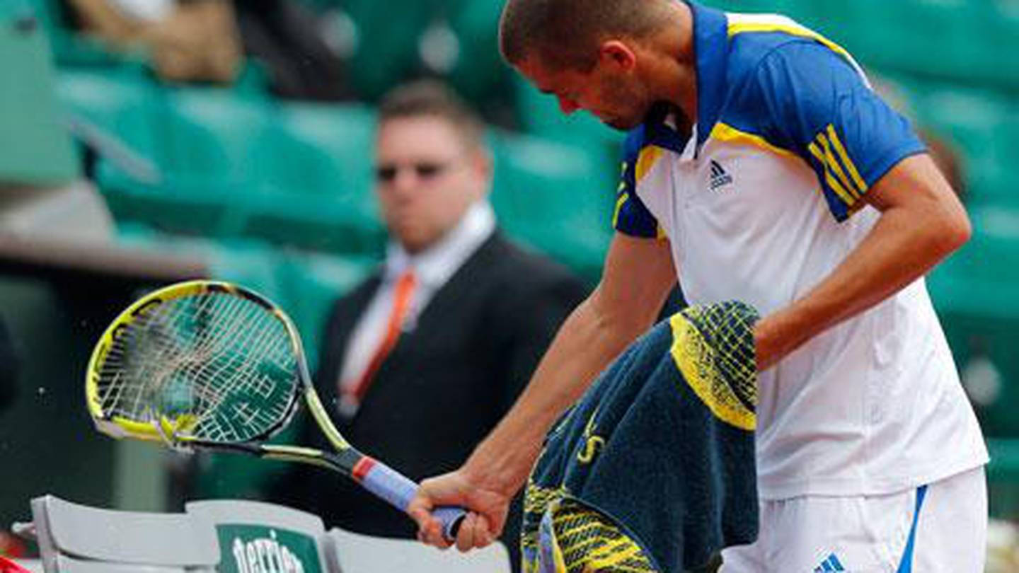 Mikhail Youzhny Holding Broken Racket Wallpaper