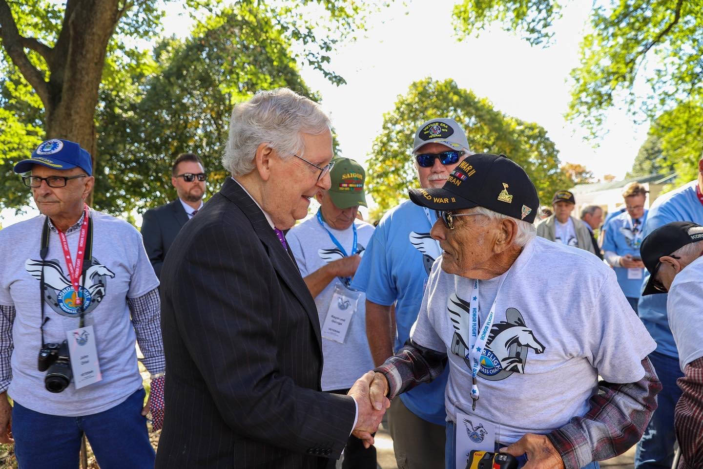 Mitch Mcconnell Shakes Hands With Senior Citizen Wallpaper