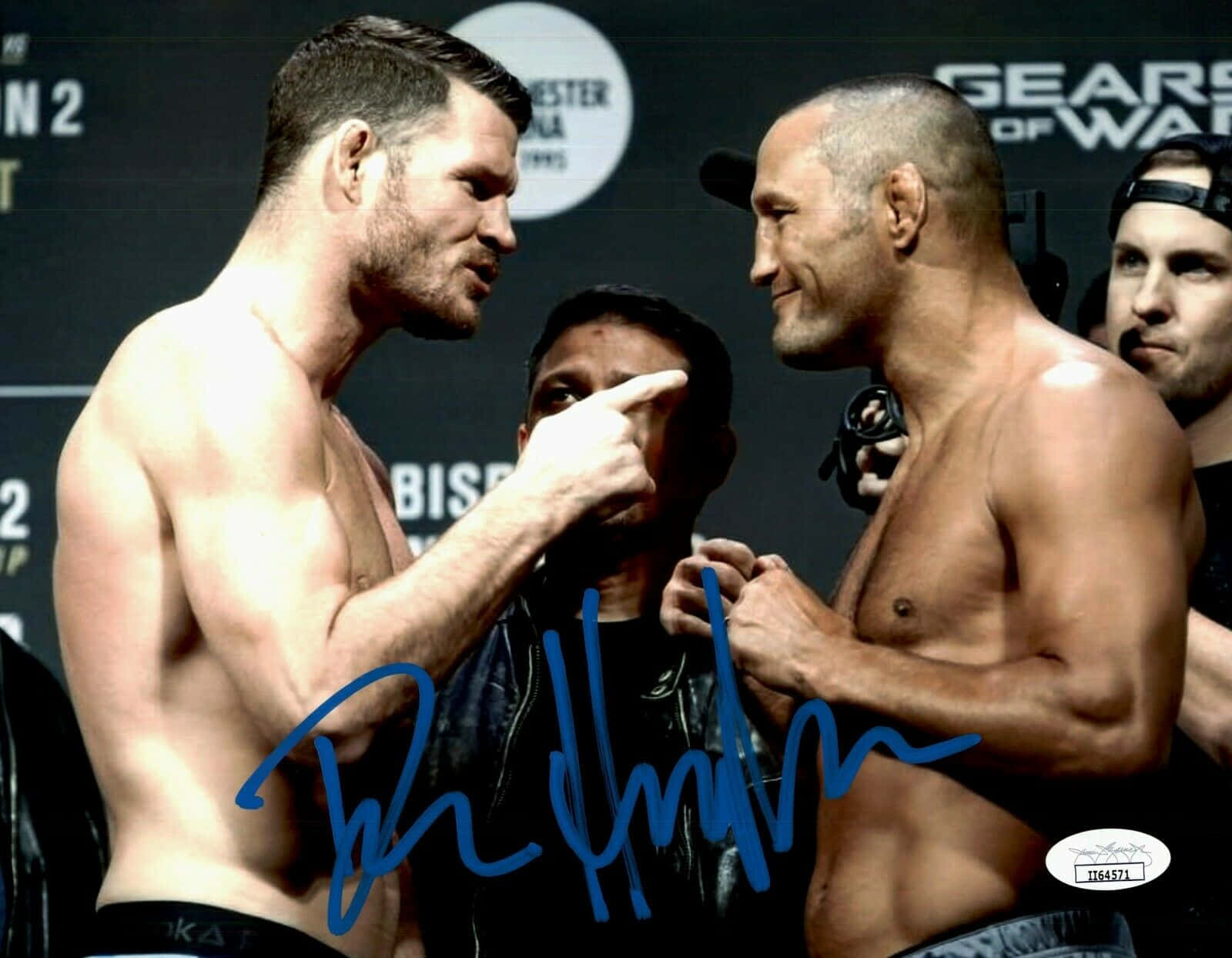 Mma Fighters Dan Henderson And Michael Bisping In Competitive Action Wallpaper