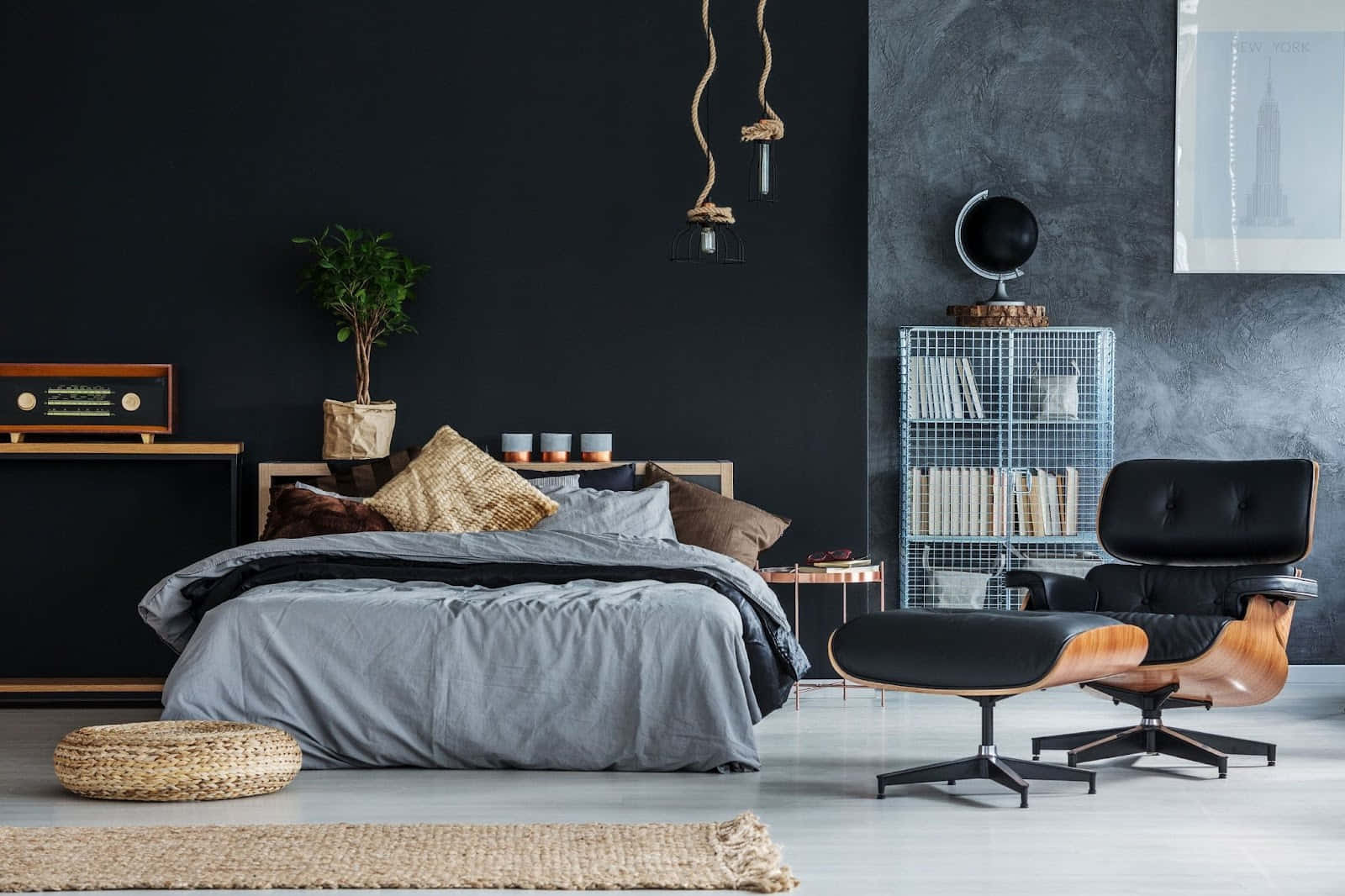 Modern Black Lounging Chair In Elegant Bedroom Wallpaper