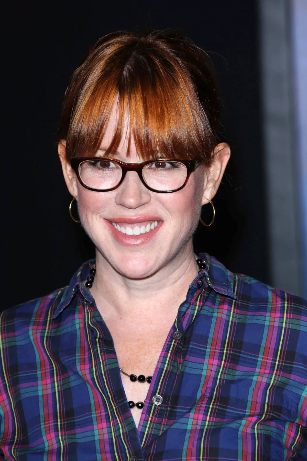Molly Ringwald, Iconic 80s Actress, Sporting Nerdy Glasses Wallpaper