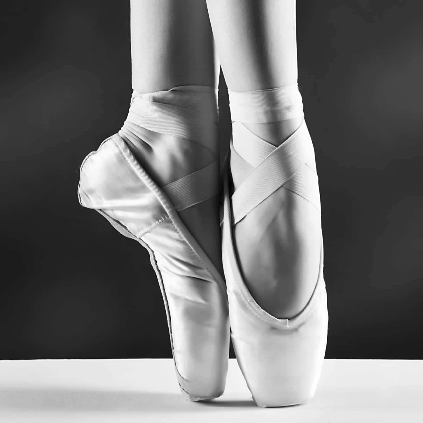 Monochrome Elegance Of Pointe Ballet Shoes Wallpaper