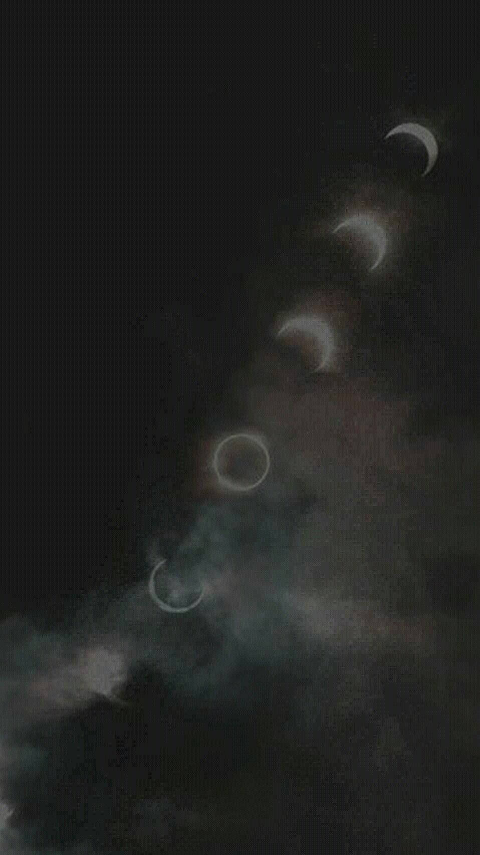 Moon Phases In Black Sky Indie Phone Wallpaper