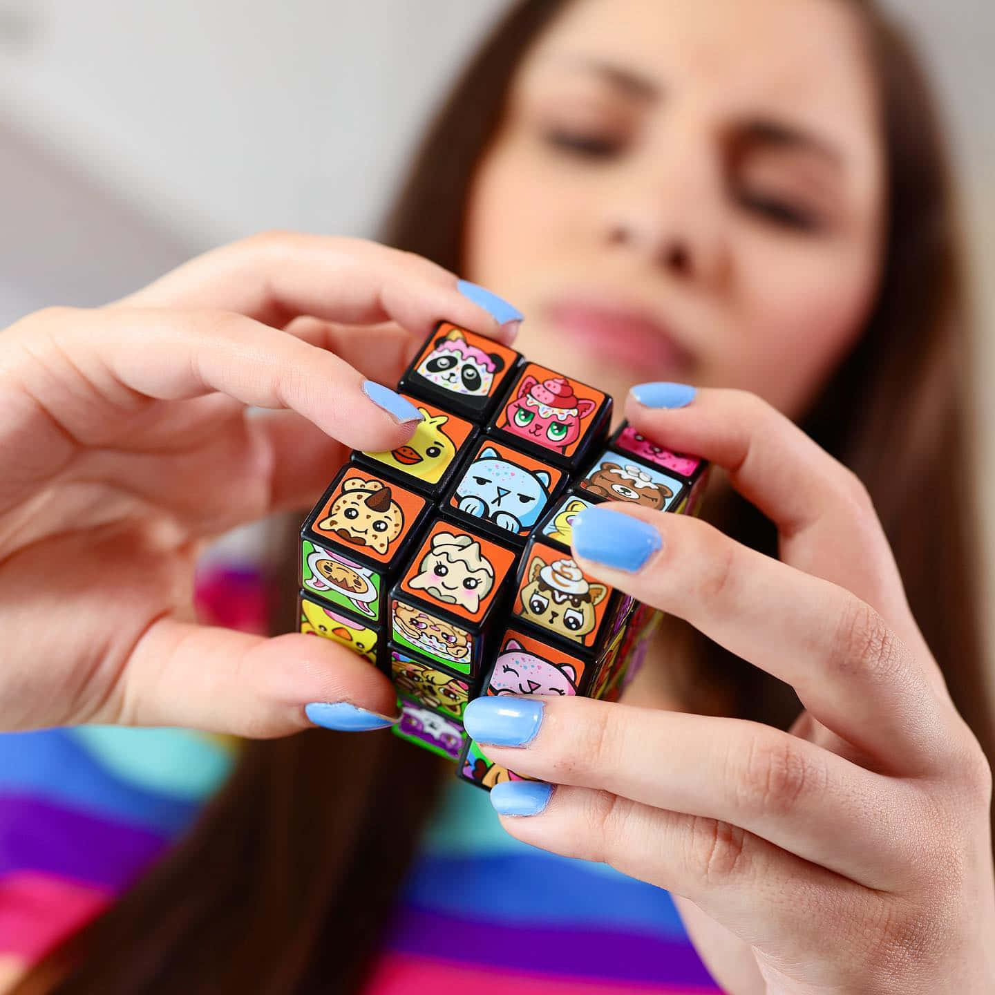 Moriah Elizabeth Holding Rubik's Cube Wallpaper