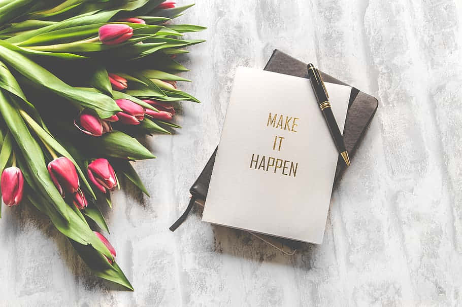 Motivational Notebookand Tulips Wallpaper