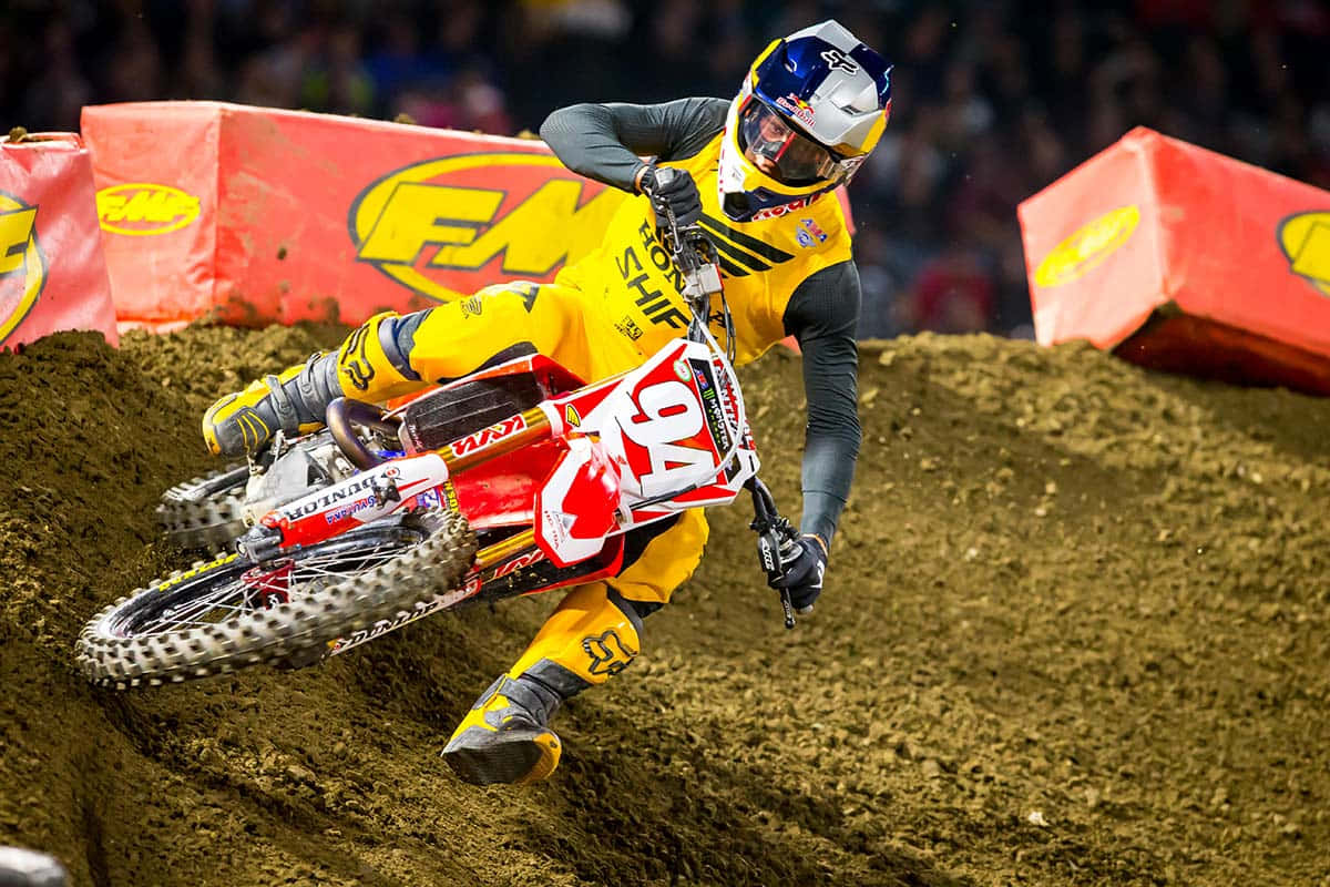 Motocross Champion Ken Roczen Competing In A Race Wallpaper