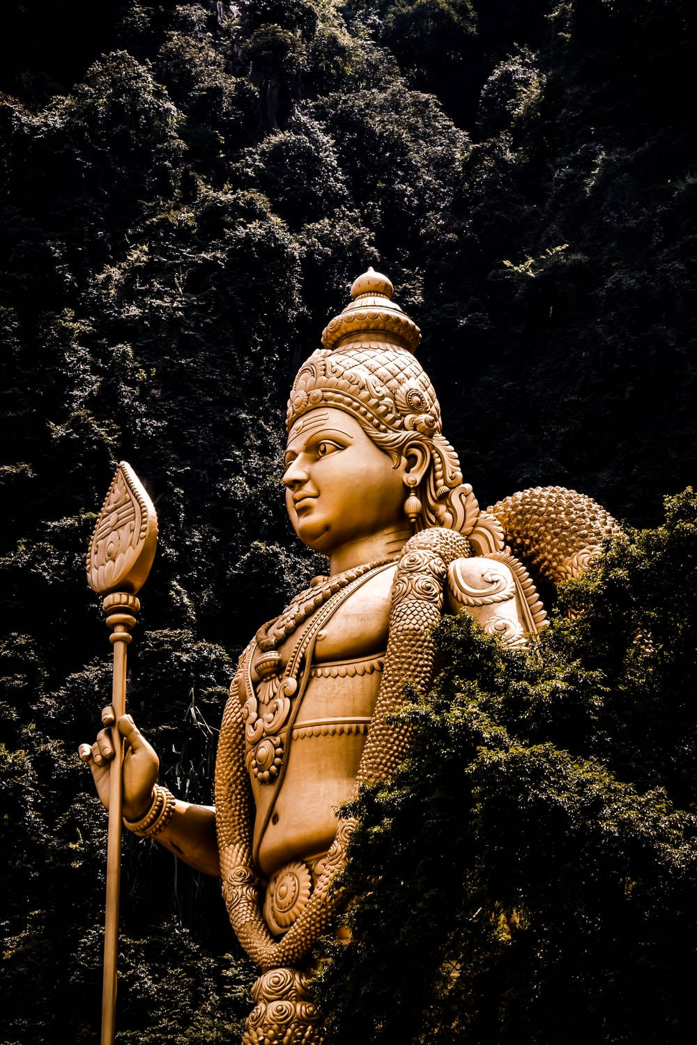 Murugan Statue With Trees Wallpaper
