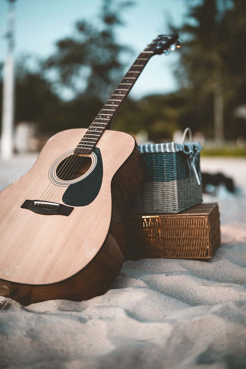 Musical Instrument Guitar On Beach Wallpaper