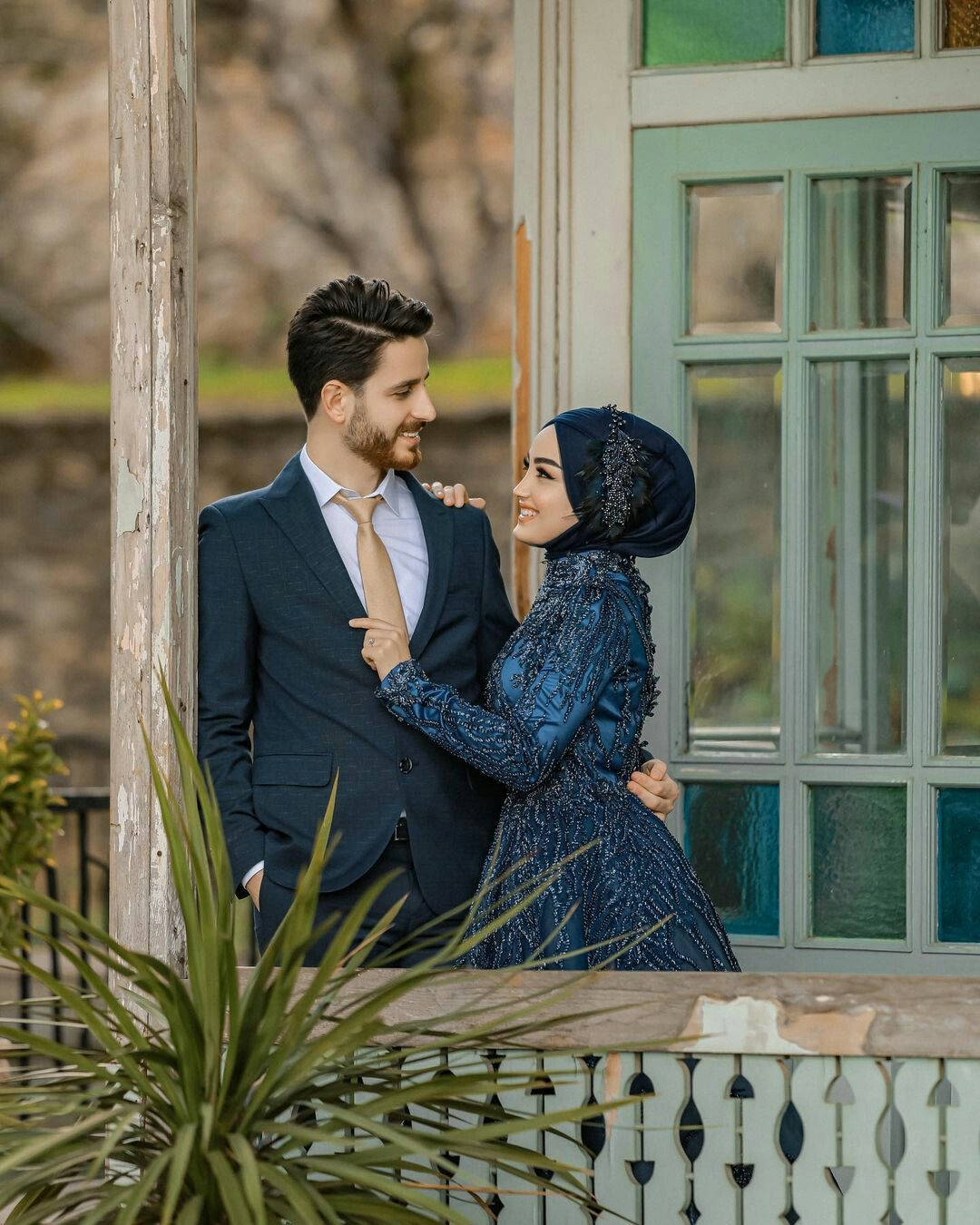 Muslim Couple At Veranda Photoshoot Wallpaper