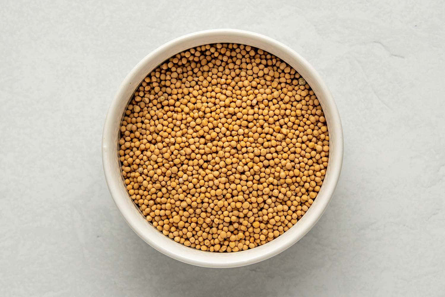 Mustard Seedsin White Bowl Wallpaper