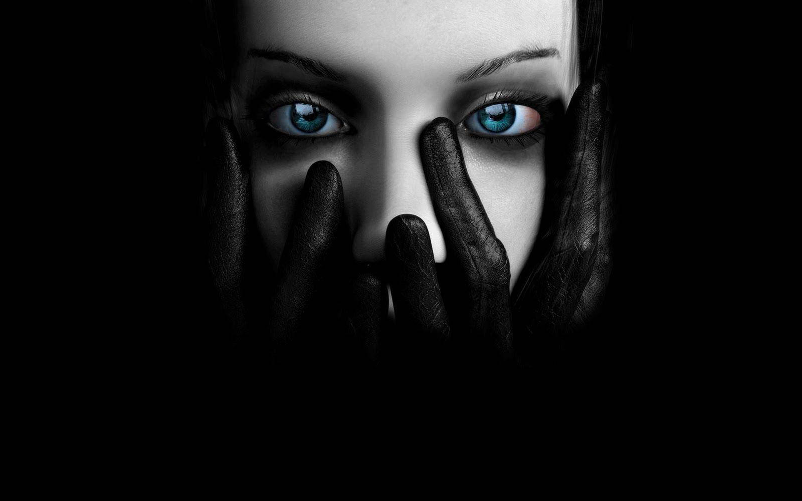 Mysterious Blue-eyed Woman In Dark Wallpaper