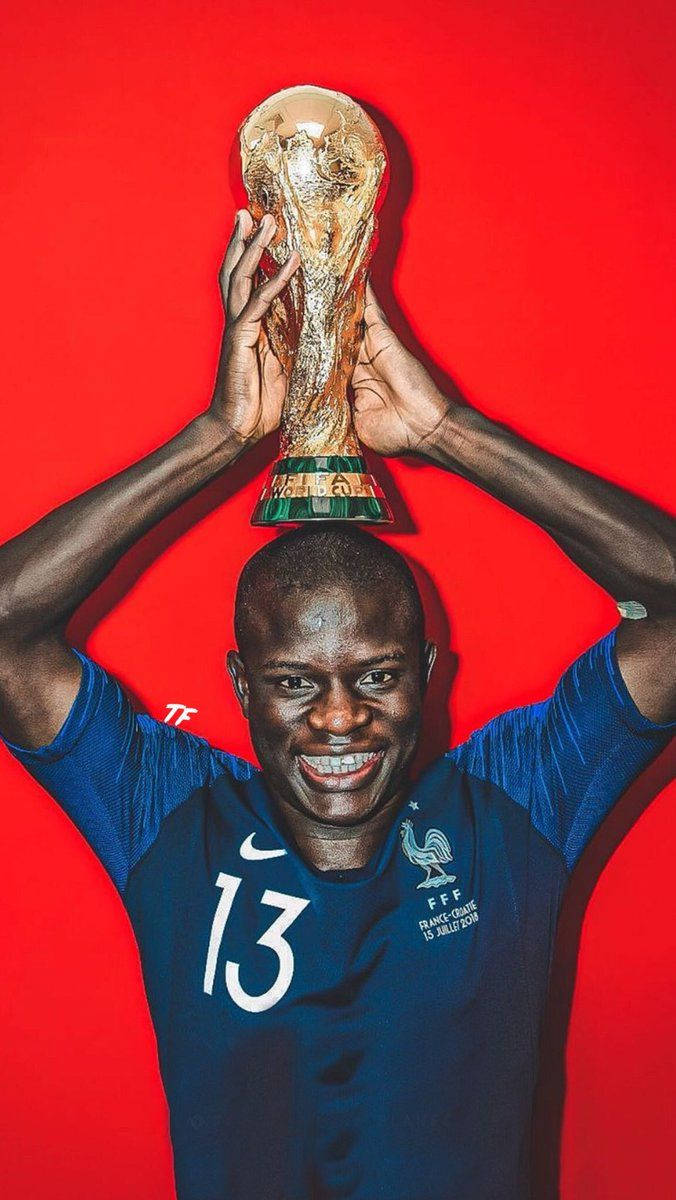 N'golo Kante Holding A Trophy Wallpaper