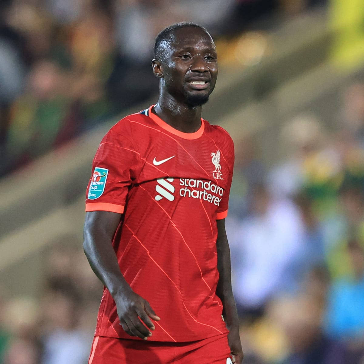 Naby Keita Smiling Red Shades Wallpaper