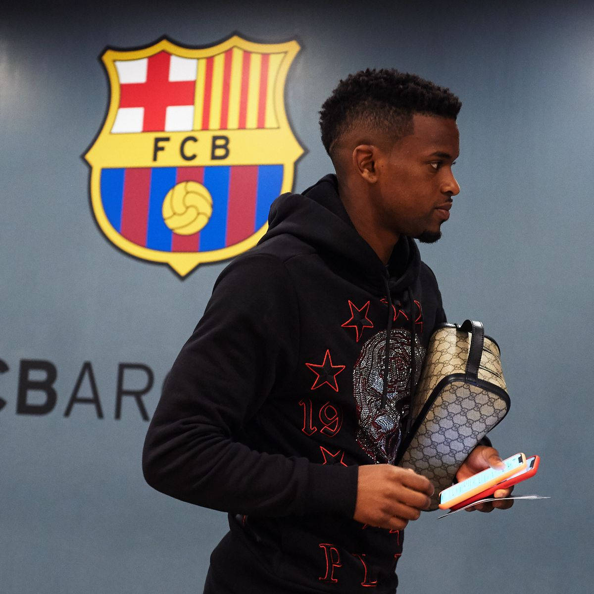 Nelson Semedo And Fc Barcelona Logo Wallpaper