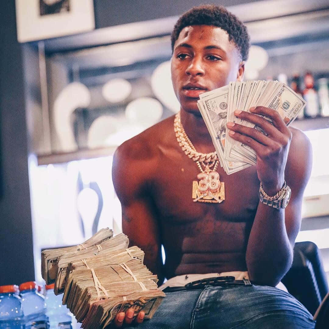 Never Broke Again Flexing His Dollars Wallpaper