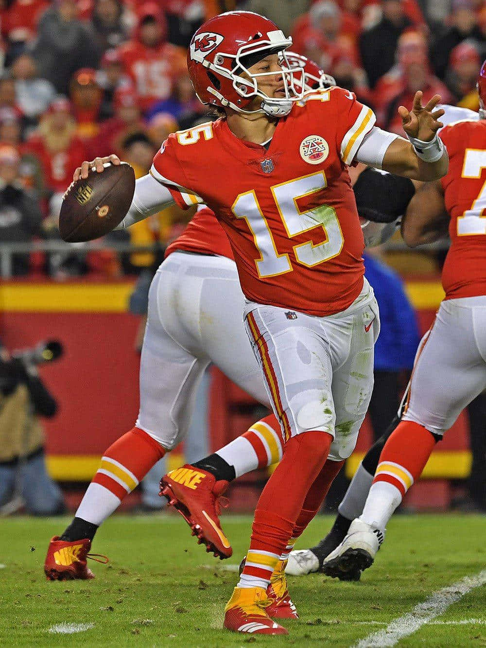 Nfl All-star Pat Mahomes On The Phone Wallpaper