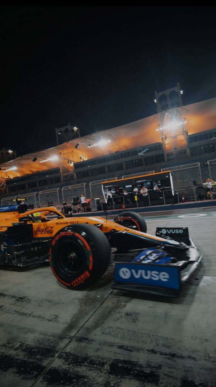 Night-time Passion: Daniel Ricciardo Behind The Wheel Of His F1 Car Wallpaper