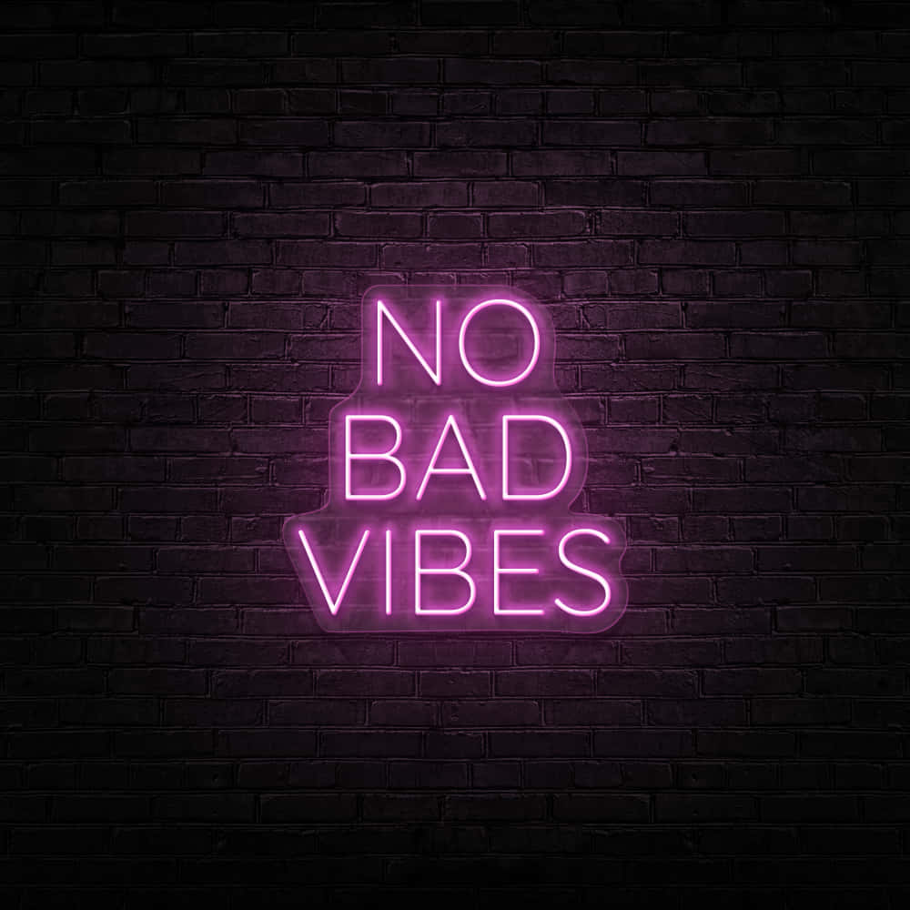 No Bad Vibes Neon Sign On Brick Wall Wallpaper