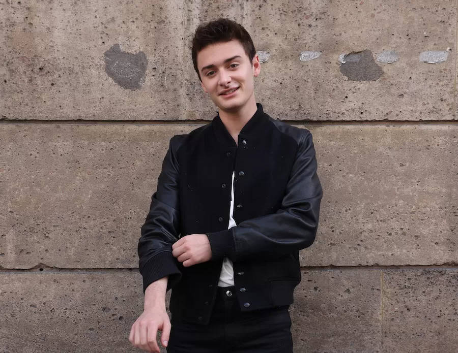 Noah Schnapp Wearing Black Bomber Jacket Wallpaper