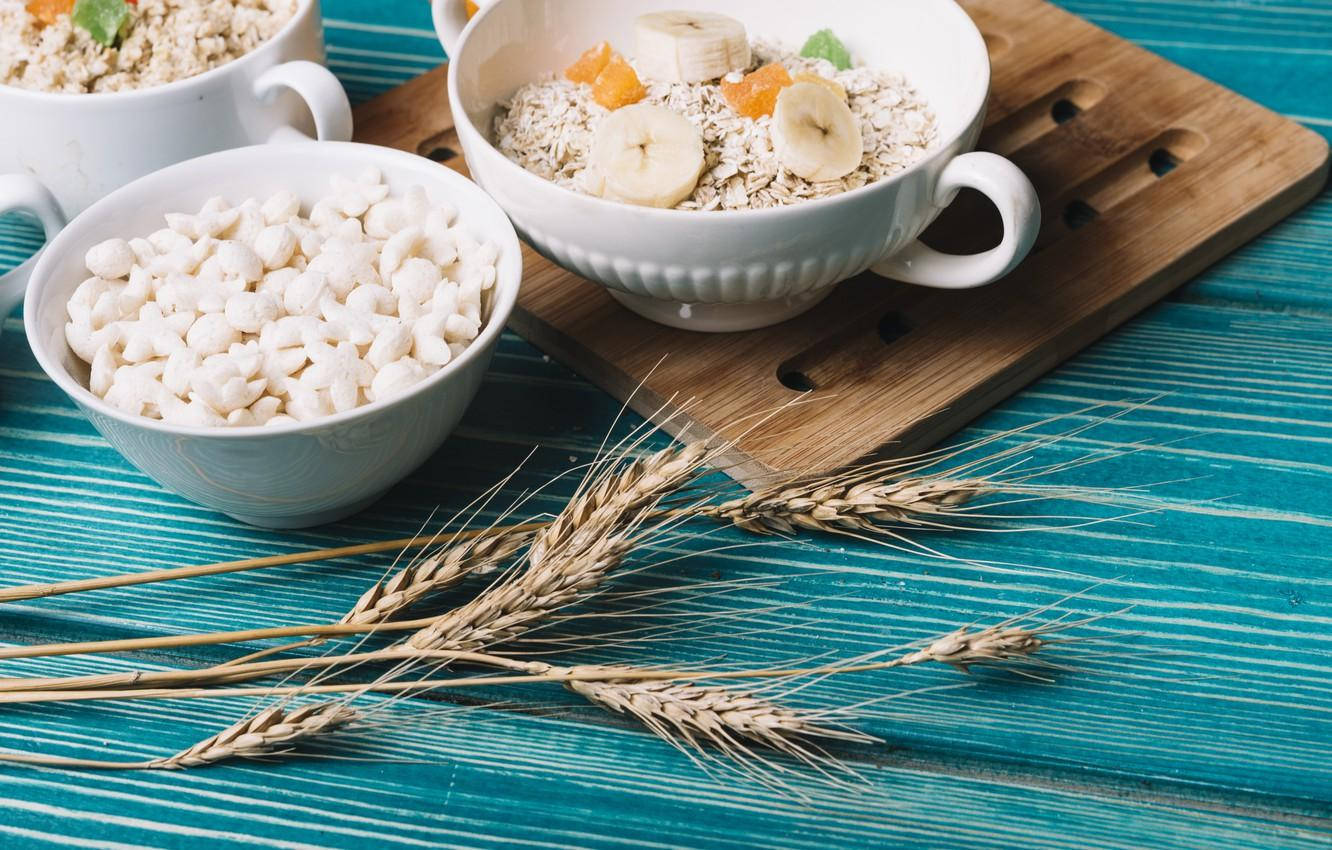 Oatmeal Bowl With Bananas And Clementines Wallpaper