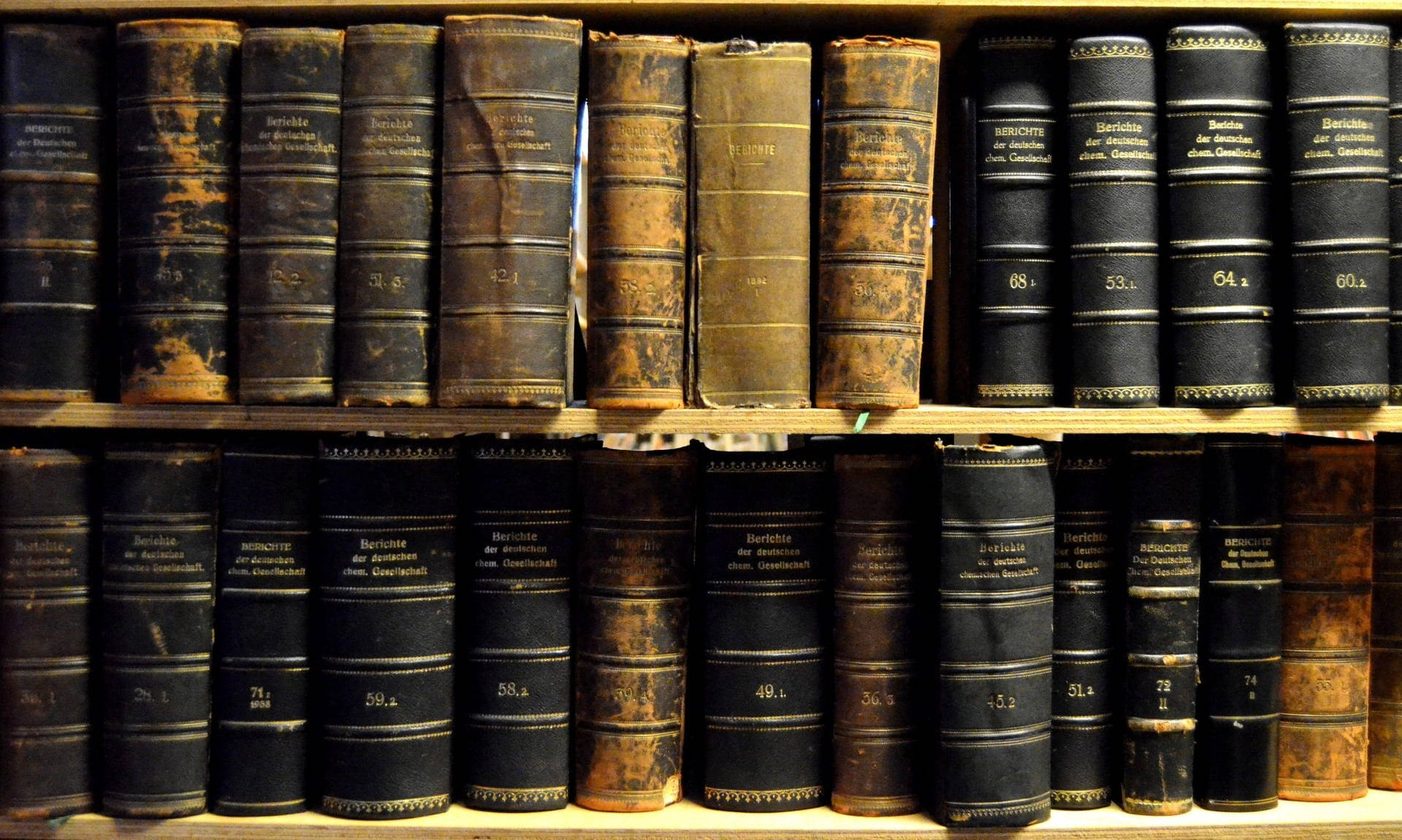 Old Reference Books On Shelf Wallpaper