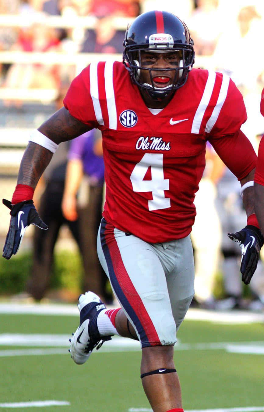 Ole Miss Football Player Running Wallpaper