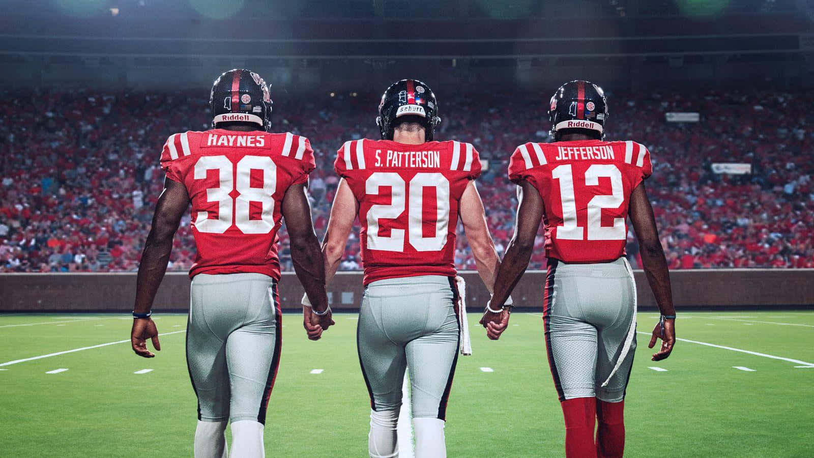 Ole Miss Three Football Players Wallpaper