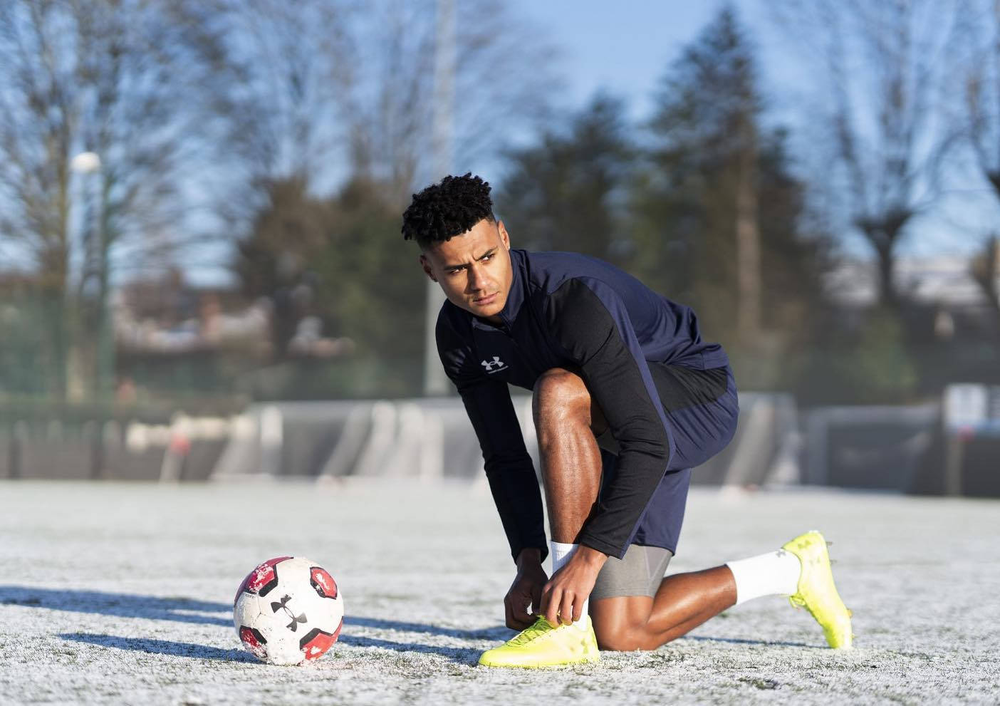 Ollie Watkins Fixing His Shoes Wallpaper