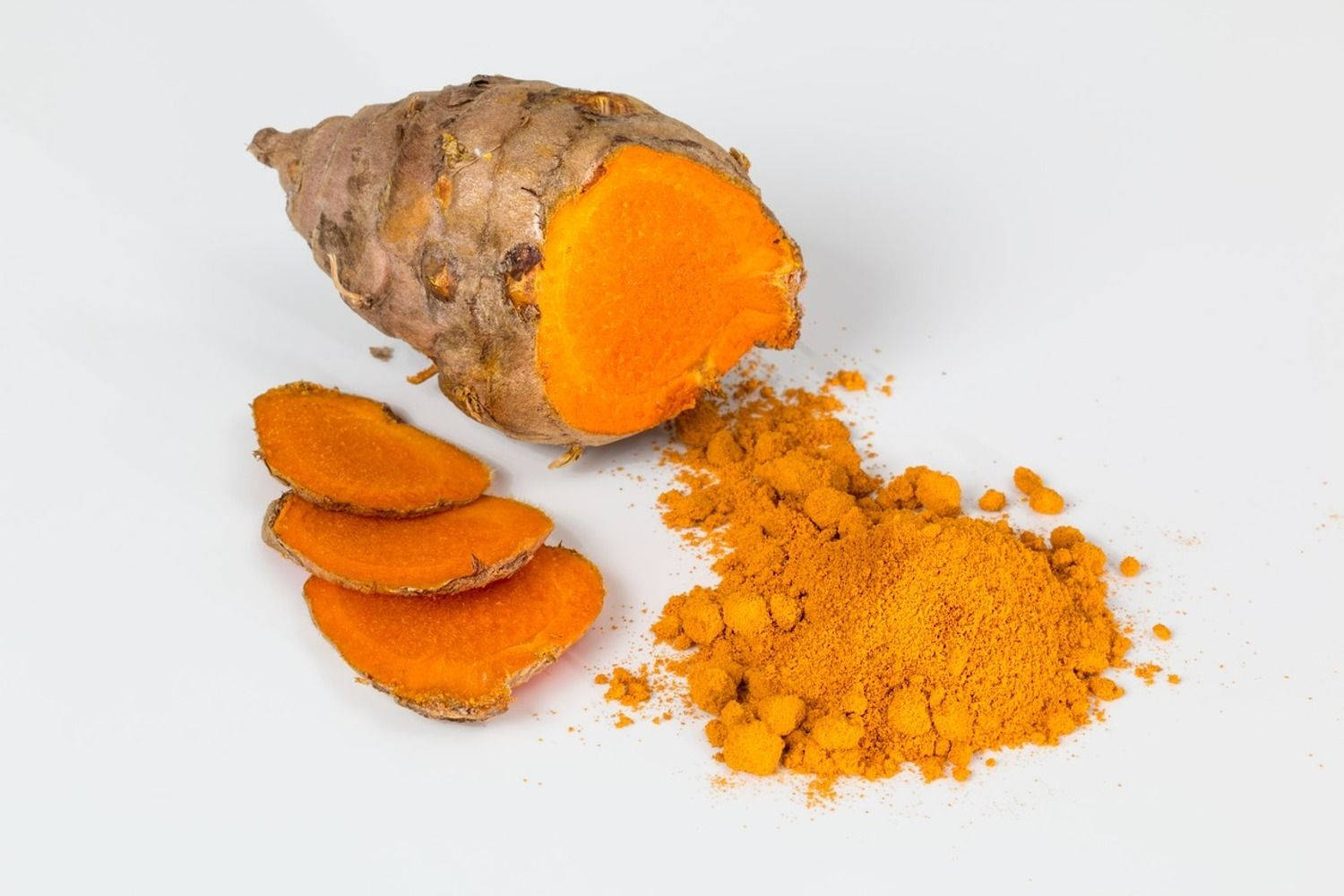 Orange Turmeric Powder And Slices Wallpaper