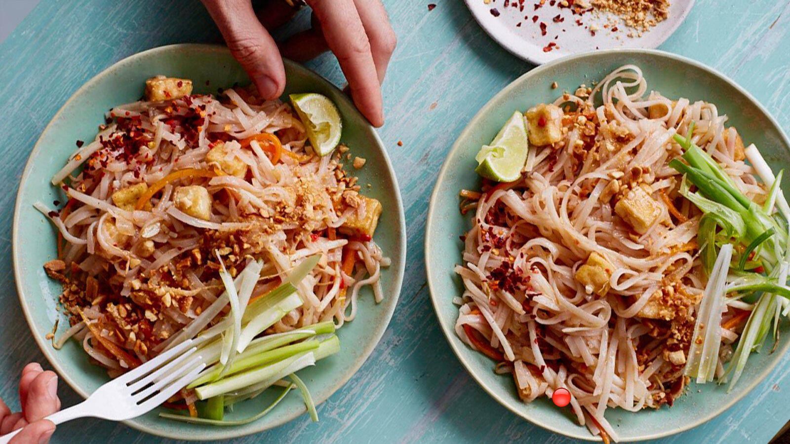 Pad Thai On Blue Platters With Spring Onions Wallpaper