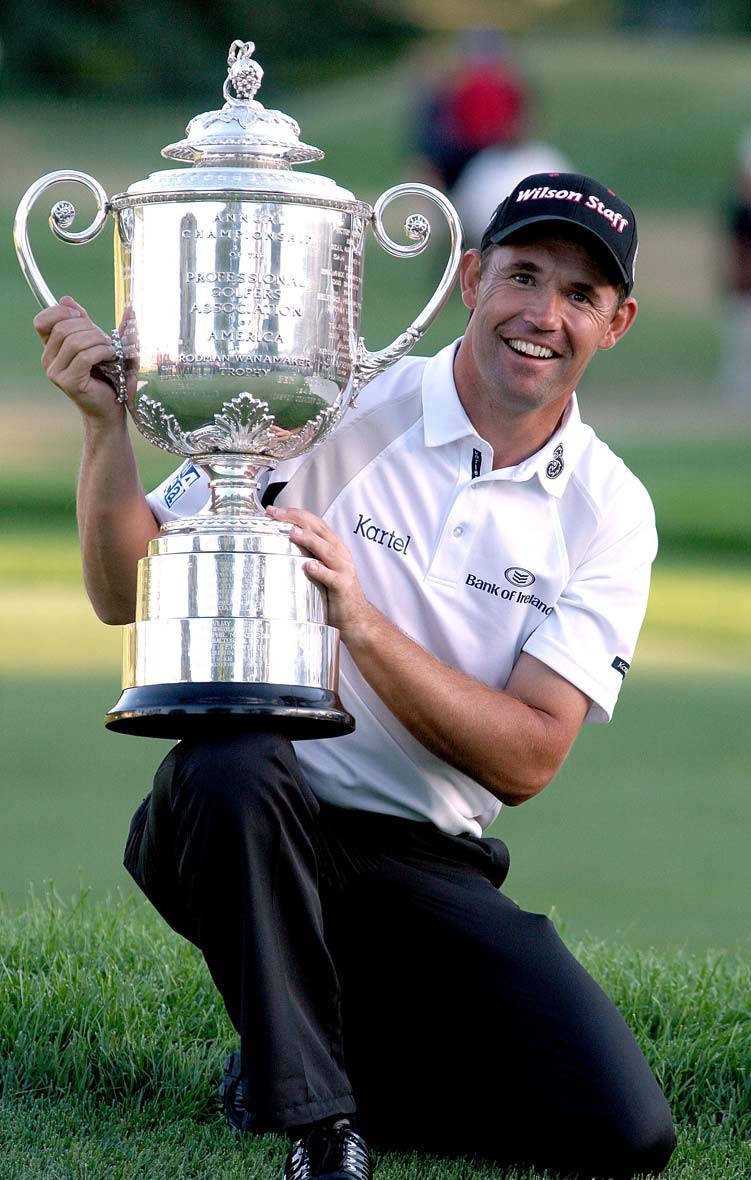 Padraig Harrington Holding Giant Trophy Wallpaper