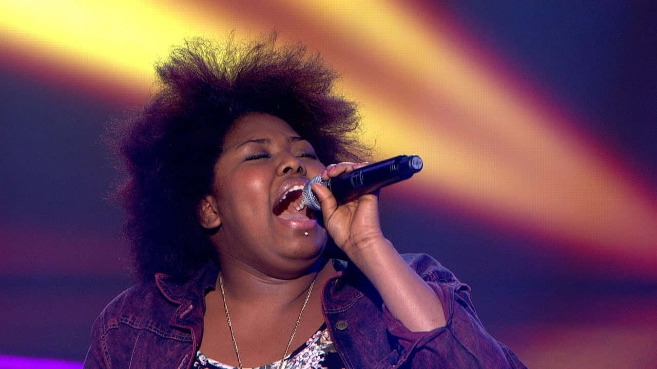 Passionate Singer Performance Wallpaper