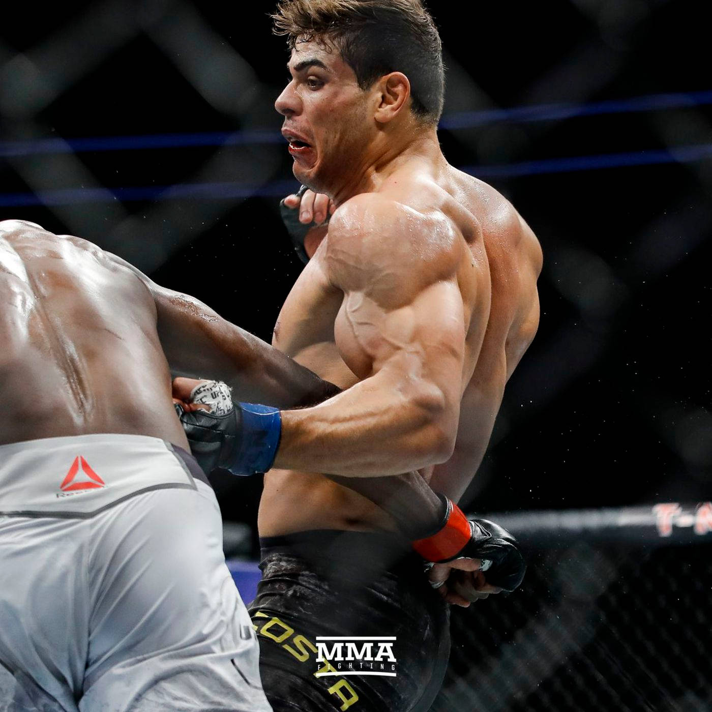 Paulo Costa Skillfully Avoiding Punch Wallpaper