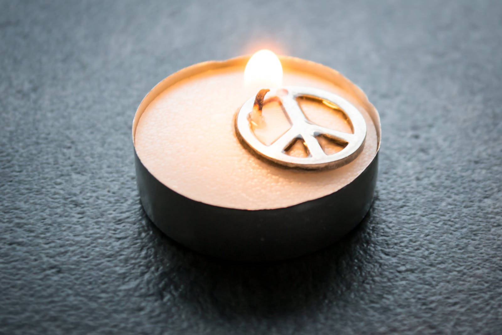 Peace Symbol On A Candle Wallpaper