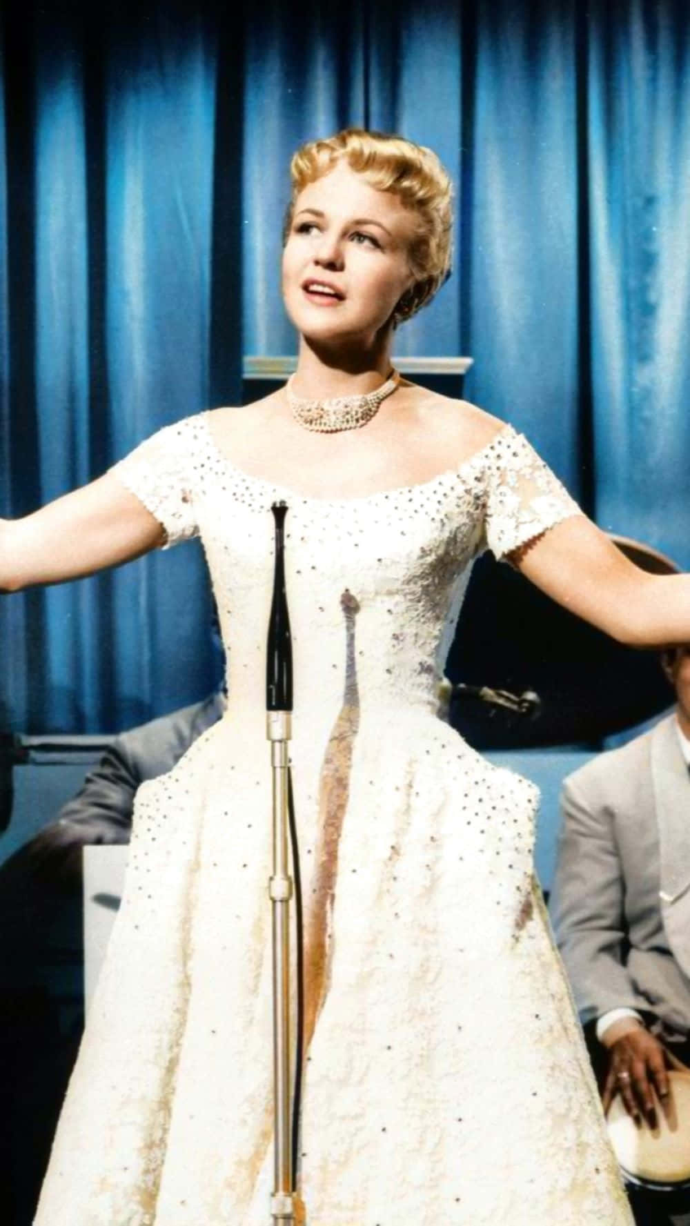 Peggy Lee Performingin Elegant Gown Wallpaper