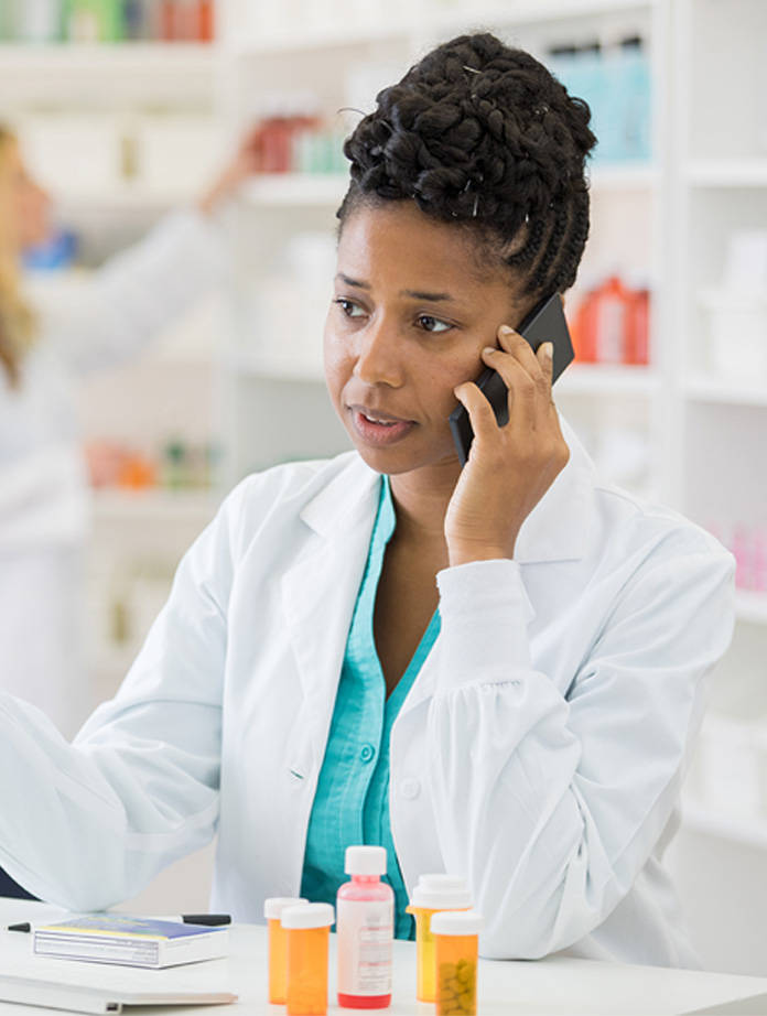 Pharmacist Consulting Over The Phone Wallpaper