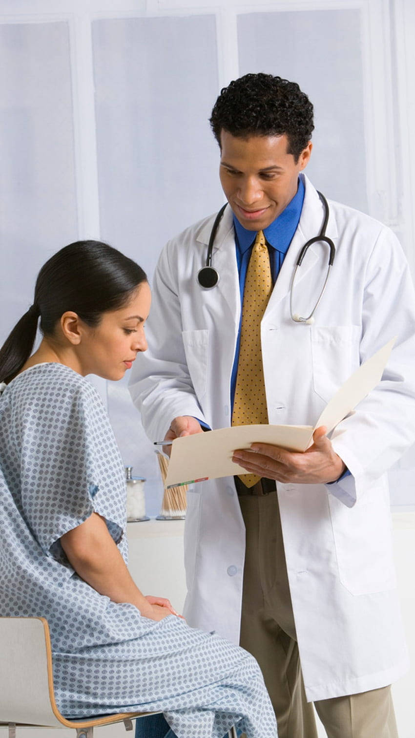 Physician Talking To His Patients Wallpaper