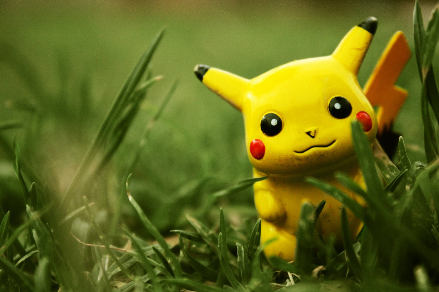 Pikachu Figure On Grass Wallpaper