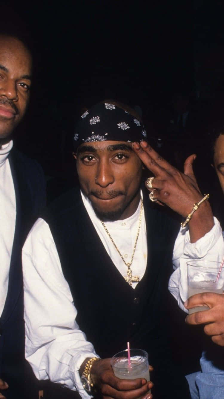 Posing With Hand Signal Tupac Iphone Wallpaper