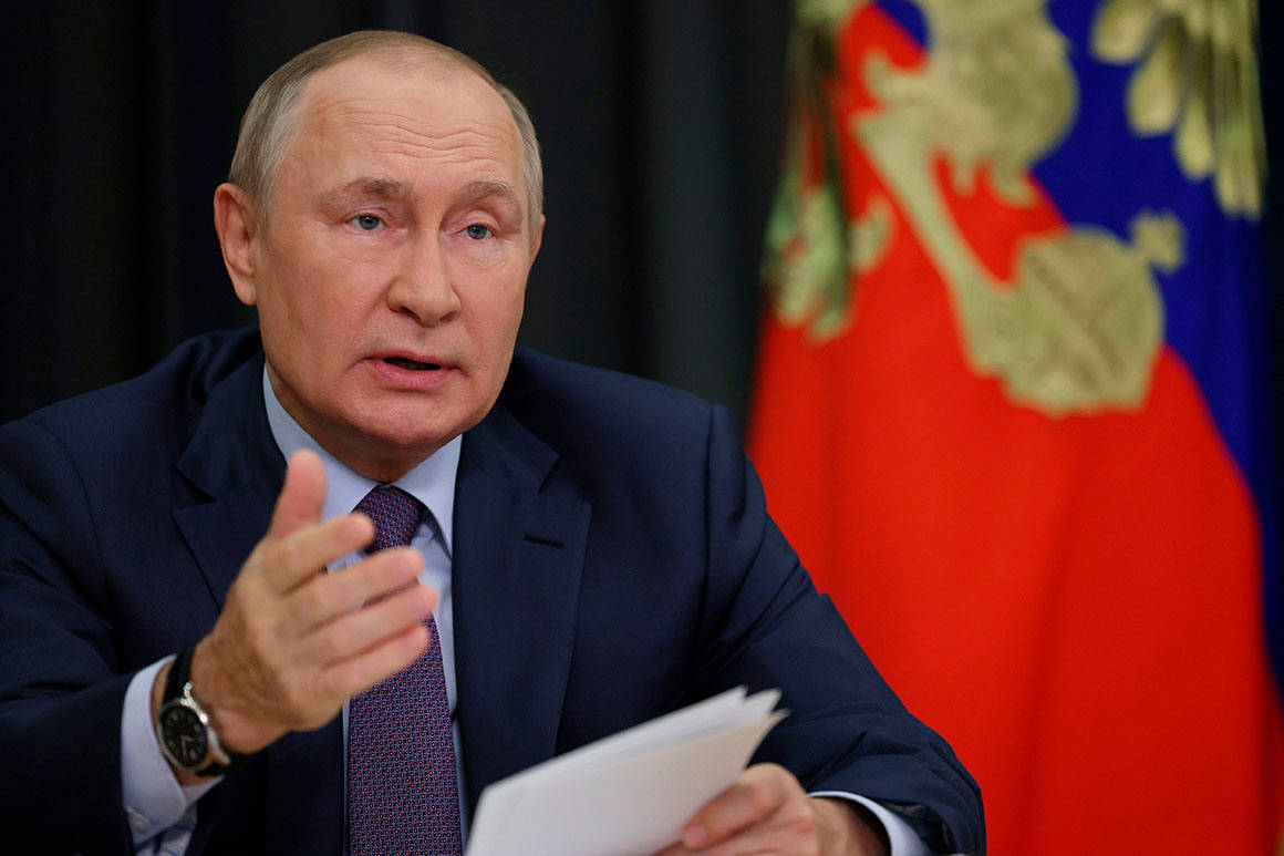 President Vladimir Putin Employing A Significant Hand Gesture Wallpaper