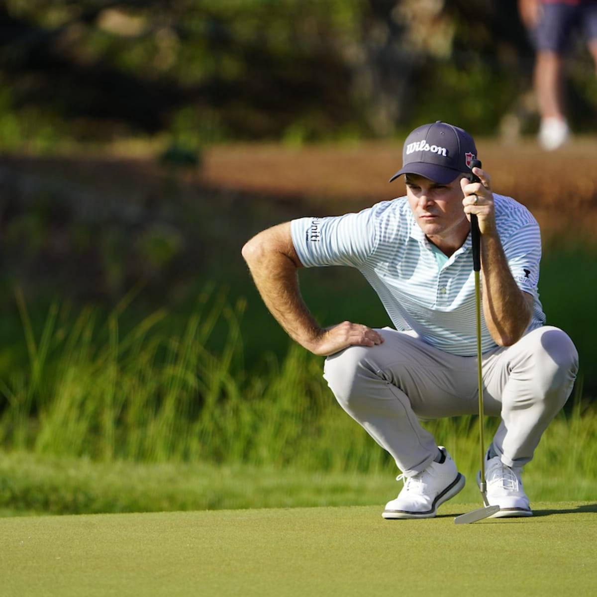 Professional Golfer Kevin Streelman Thoroughly Analyzing His Next Move On The Course Wallpaper