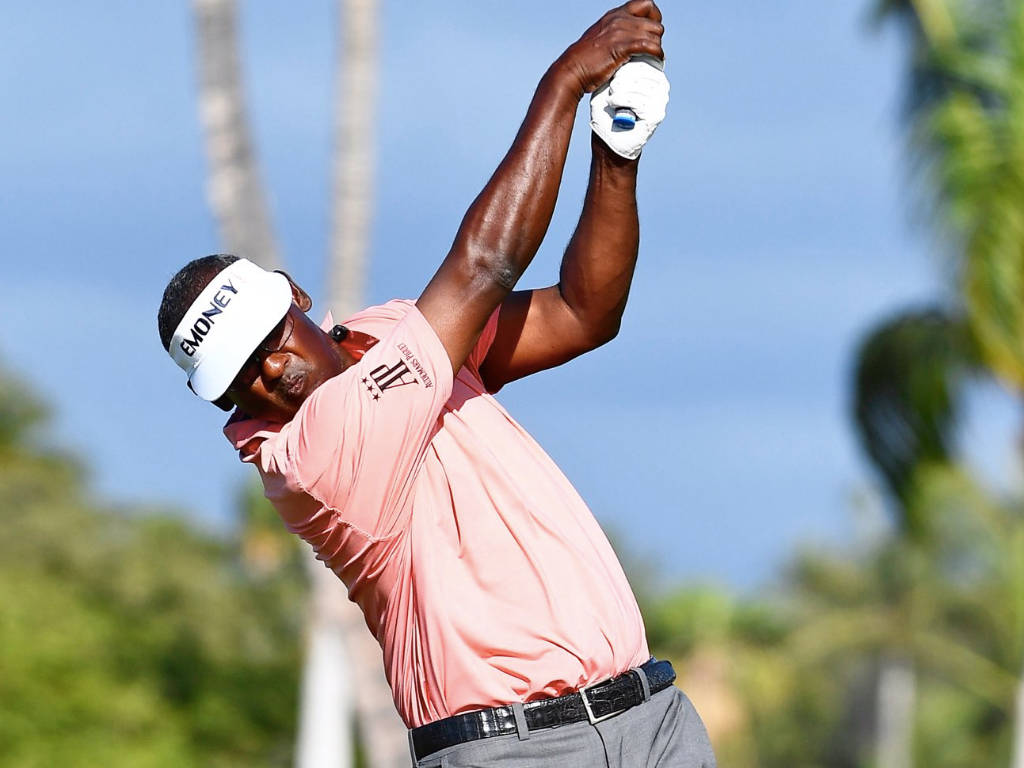 Professional Golfer Vijay Singh In Casual Pink Shirt Wallpaper