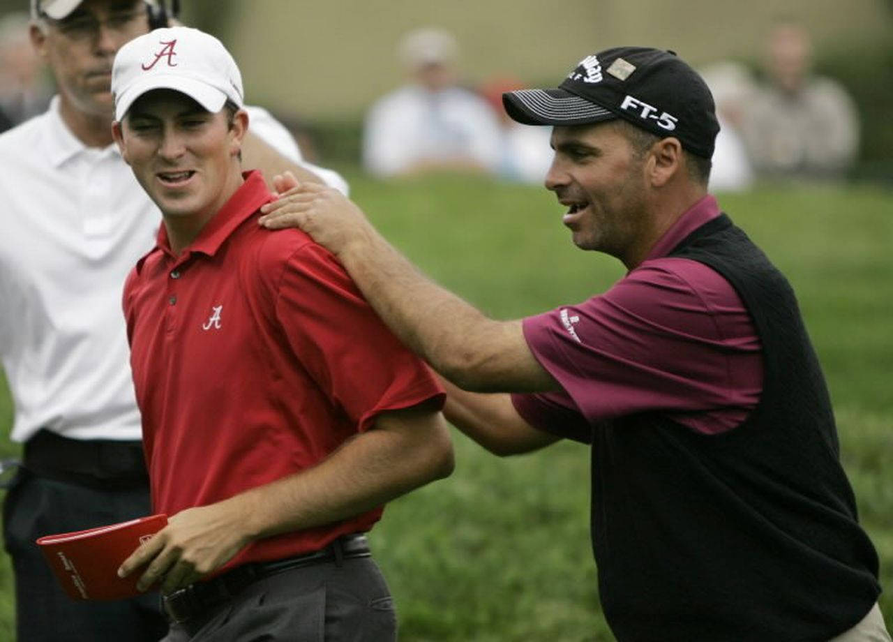 Professional Golfers Michael Thompson And Rocco Mediate In Action Wallpaper