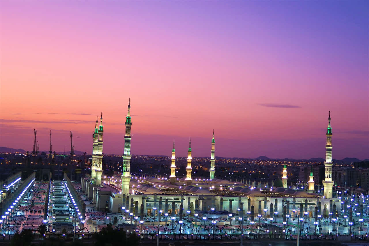 Prophet's Mosque At Twilight In Madina Wallpaper