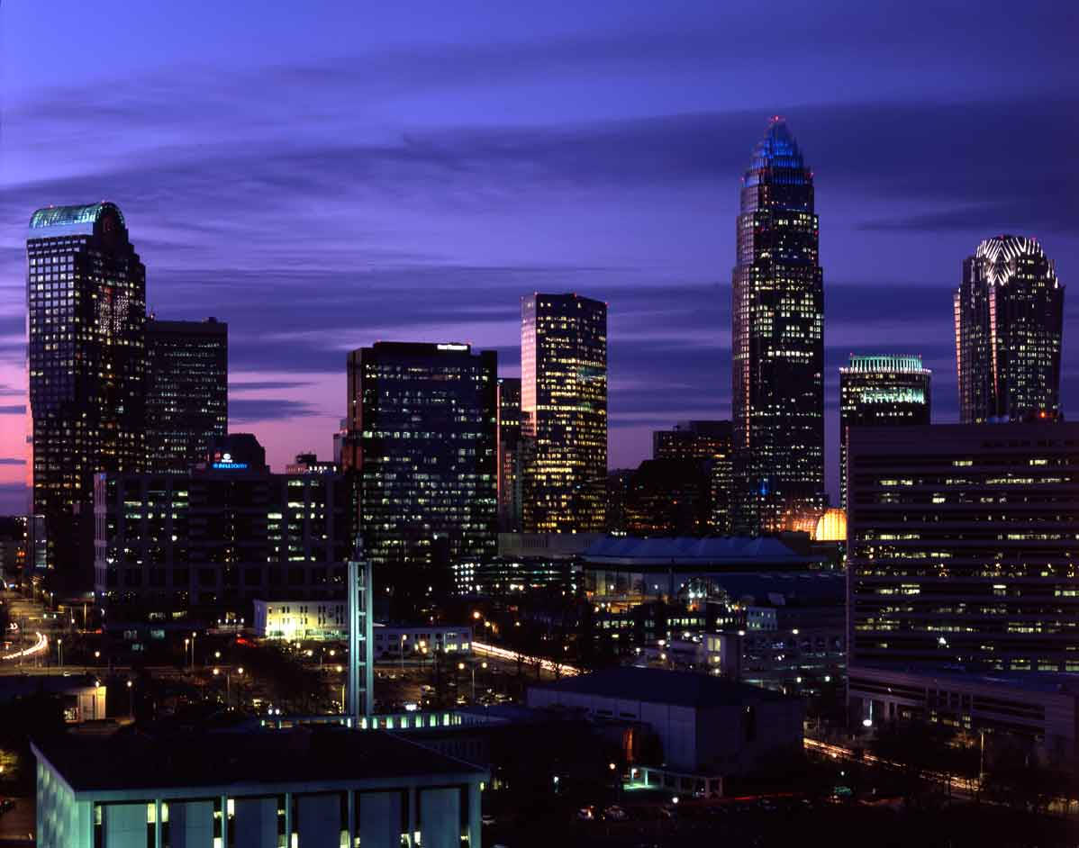 Purple Skies Above Durham's Skyscrapers Wallpaper