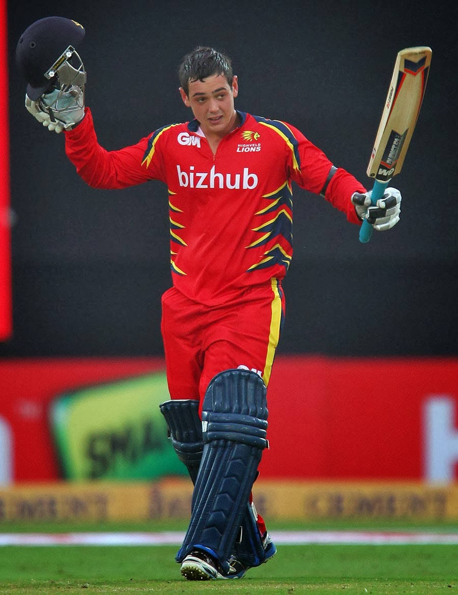 Quinton De Kock In Action In Vibrant Red Cricket Kit Wallpaper