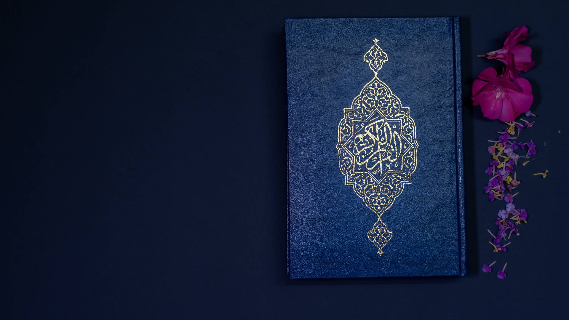 Qur'an Beside Flower Pc Wallpaper
