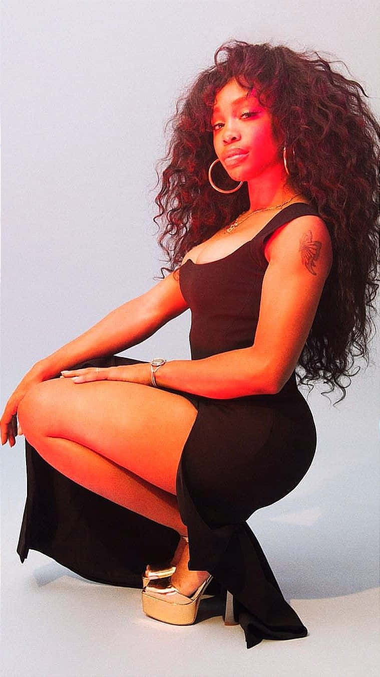 R&b Artist Sza Expressing Her Passion For Music Wallpaper