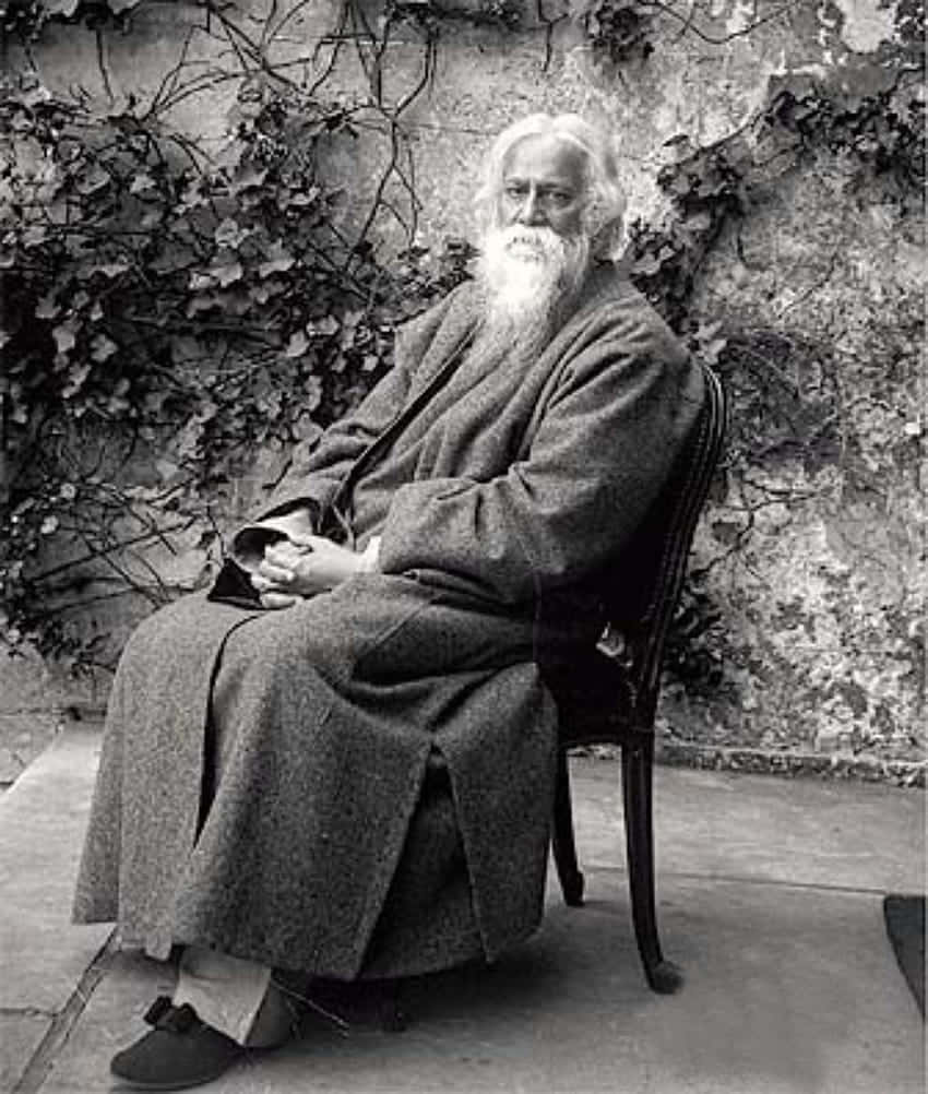 Rabindranath Tagore Seated Outdoors Wallpaper